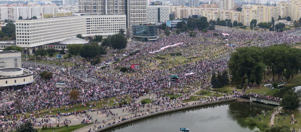 Belarusian opposition supporters rally in the center of Minsk, Belarus, Sunday, Aug. 23, 2020. A vast demonstration with many thousands of protesters demanding the resignation of Belarus' authoritarian president are rallying in the capital, continuing the public dissent since the disputed presidential election. Belarusian opposition supporters rally in the center of Minsk, Belarus, Sunday, Aug. 23, 2020. A vast demonstration with many thousands of protesters demanding the resignation of Belarus' authoritarian president are rallying in the capital, continuing the public dissent since the disputed presidential election. - Sputnik International