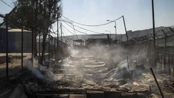 A picture taken on September 9, 2020 shows the burnt camp of Moria on the island of Lesbos after a major fire broke out. A picture taken on September 9, 2020 shows the burnt camp of Moria on the island of Lesbos after a major fire broke out. - Sputnik International