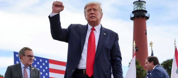US President Donald Trump pumps his fist at the crowd after signing an extension of the ban on offshore drilling off the coast of the state of Florida in front of a crowd of Trump supporters as US Environmental Protection Agency Director Andrew Wheeler and Florida Governor Ron DeSantis look on in Jupiter, Florida, U.S. September 8, 2020 US President Donald Trump pumps his fist at the crowd after signing an extension of the ban on offshore drilling off the coast of the state of Florida in front of a crowd of Trump supporters as US Environmental Protection Agency Director Andrew Wheeler and Florida Governor Ron DeSantis look on in Jupiter, Florida, U.S. September 8, 2020 - Sputnik International