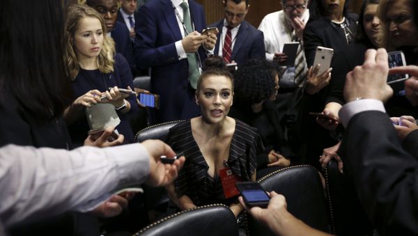 Actress Alyssa Milano talks to the media after she arrived for the Senate Judiciary hearing on Capitol Hill in Washington, Thursday, Sept. 27, 2018 Actress Alyssa Milano talks to the media after she arrived for the Senate Judiciary hearing on Capitol Hill in Washington, Thursday, Sept. 27, 2018 - Sputnik International