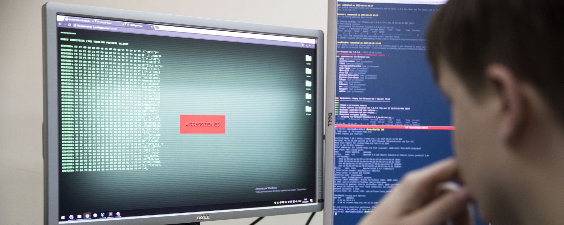 An employee of Global Cyber Security Company Group-IB develops a computer code in an office in Moscow, Russia, Wednesday, Oct. 25, 2017. A new strain of malicious software has paralyzed computers at a Ukrainian airport, the Ukrainian capital's subway and at some independent Russian media. Moscow-based Global Cyber Security Company Group-IB said in a statement Wednesday the ransomware called BadRabbit also tried to penetrate the computers of major Russian banks but failed. None of the banks has reported any attacks. An employee of Global Cyber Security Company Group-IB develops a computer code in an office in Moscow, Russia, Wednesday, Oct. 25, 2017. A new strain of malicious software has paralyzed computers at a Ukrainian airport, the Ukrainian capital's subway and at some independent Russian media. Moscow-based Global Cyber Security Company Group-IB said in a statement Wednesday the ransomware called BadRabbit also tried to penetrate the computers of major Russian banks but failed. None of the banks has reported any attacks. - Sputnik International, 1920, 02.09.2021