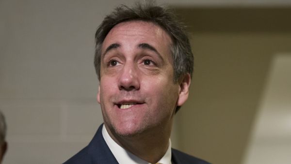 Michael Cohen, President Donald Trump's former lawyer, pauses to speak with the media as he departs after testifying before a closed-door hearing of the House Intelligence Committee, on Capitol Hill, Thursday, Feb. 28, 2019, in Washington - Sputnik International