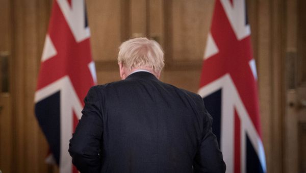 Britain's Prime Minister Boris Johnson is seen at the end of a virtual news conference on the ongoing situation with the coronavirus disease (COVID-19), at Downing Street, London, Britain September 9, 2020. Britain's Prime Minister Boris Johnson is seen at the end of a virtual news conference on the ongoing situation with the coronavirus disease (COVID-19), at Downing Street, London, Britain September 9, 2020. - Sputnik International
