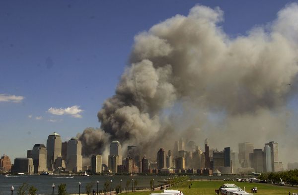 The World Trade Center is seen burning in New York City in this view from Liberty State Park in Jersey City, N.J., after the attacks on the towers and at the Pentagon in Washington The World Trade Center is seen burning in New York City in this view from Liberty State Park in Jersey City, N.J., after the attacks on the towers and at the Pentagon in Washington - Sputnik International