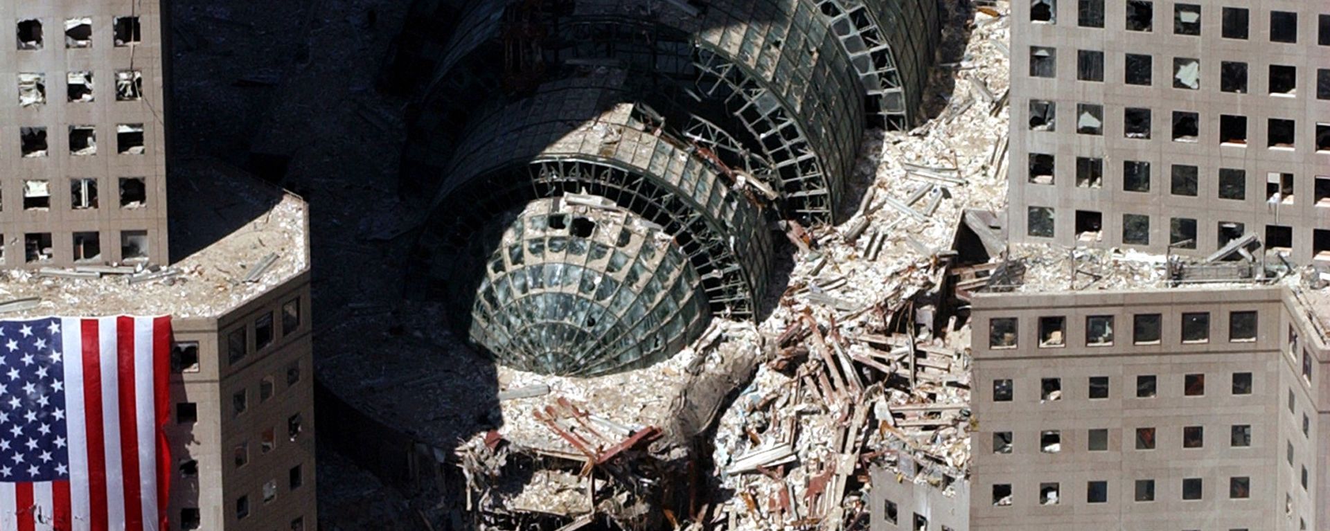 An aerial view shows a small portion of the crime scene where the World Trade Center collapsed following the 11 September terrorist attack An aerial view shows a small portion of the crime scene where the World Trade Center collapsed following the 11 September terrorist attack - Sputnik International, 1920, 11.09.2022