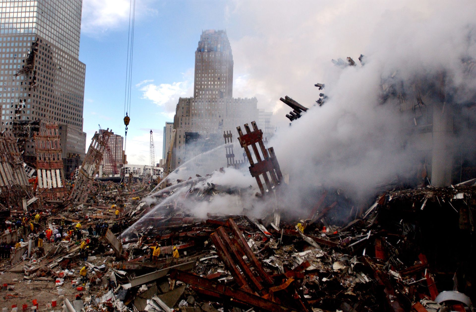 Fires still burn amidst the rubble of the World Trade Center, days after the 11 September terrorist attack. Fires still burn amidst the rubble of the World Trade Center, days after the 11 September terrorist attack. - Sputnik International, 1920, 11.09.2021