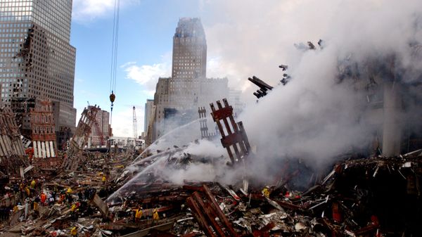 Fires still burn amidst the rubble of the World Trade Center, days after the 11 September terrorist attack. - Sputnik International