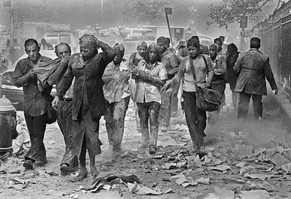 Survivors of the terrorist attacks on the World Trade Center in New York make their way through smoke, dust and debris on Fulton St., about a block from the collapsed towers in this Tuesday, September 11, 2001 file photo. Survivors of the terrorist attacks on the World Trade Center in New York make their way through smoke, dust and debris on Fulton St., about a block from the collapsed towers in this Tuesday, September 11, 2001 file photo. - Sputnik International
