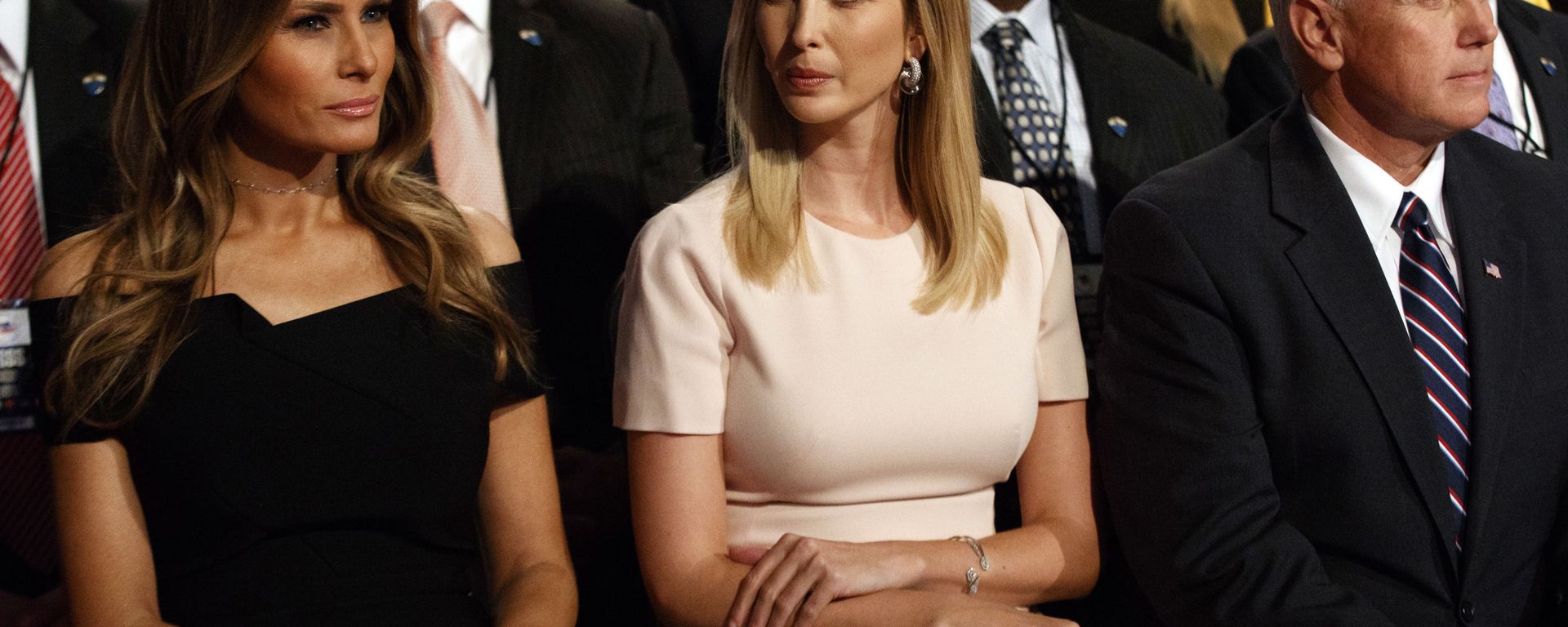 Melania Trump, left, Ivanka Trump, center, and vice presidential candidate Indiana Gov. Mike Pence wait for the beginning of the first presidential debate between Republican presidential candidate Donald Trump and Democratic presidential candidate Hillary Clinton at Hofstra University, Monday, Sept. 26, 2016, in Hempstead, N.Y - Sputnik International, 1920, 20.05.2021