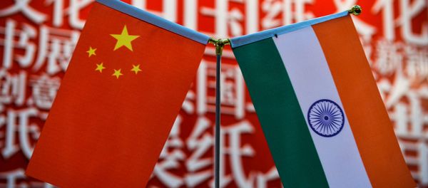The national flags of India (R) and China are seen at the Delhi World Book fair at Pragati Maidan in New Delhi on January 9, 2016. The national flags of India (R) and China are seen at the Delhi World Book fair at Pragati Maidan in New Delhi on January 9, 2016. - Sputnik International