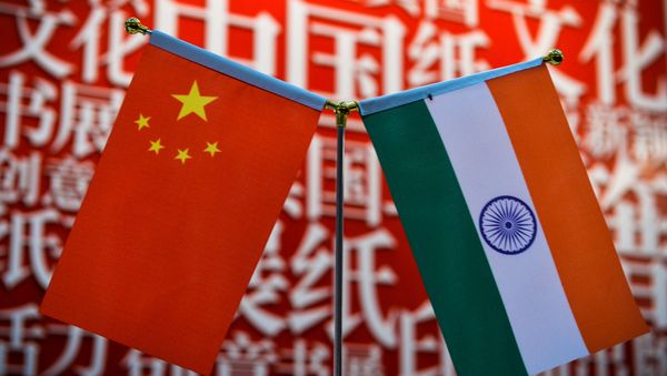 The national flags of India (R) and China are seen at the Delhi World Book fair at Pragati Maidan in New Delhi on January 9, 2016. The national flags of India (R) and China are seen at the Delhi World Book fair at Pragati Maidan in New Delhi on January 9, 2016. - Sputnik International