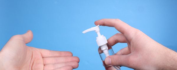 Man hand using wash hand sanitizer gel. - Sputnik International