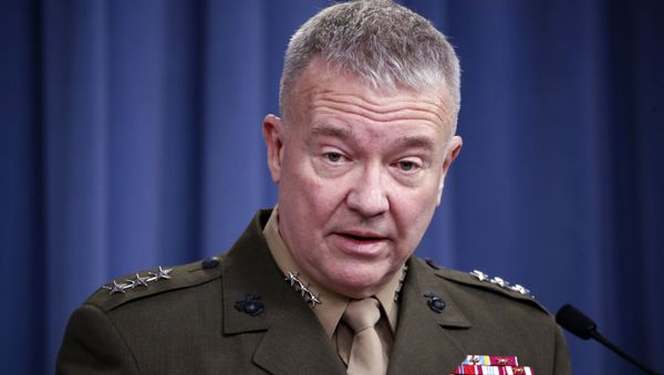 In this April1 14, 2018, file photo, then-Marine Lt. Gen. Kenneth Frank McKenzie speaks during a media availability at the Pentagon in Washington. McKenzie, the Marine general overseeing the U.S. war effort in Afghanistan says the Islamic State affiliate there has hopes of attacking the U.S. homeland. But McKenzie says the extremist group’s aspirations are being frustrated by American counterterrorism operations in its strongholds in northeastern Afghanistan.  - Sputnik International