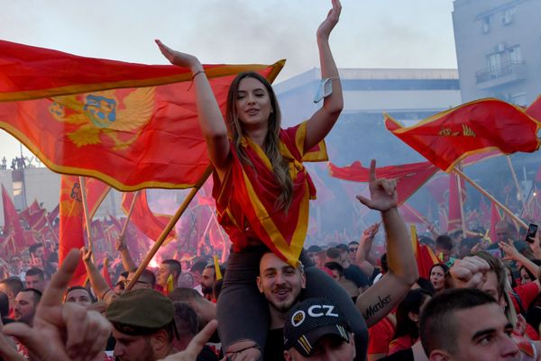 Self-described patriots wave flags during a post-election rally in Podgorica, on September 6, 2020 Self-described patriots wave flags during a post-election rally in Podgorica, on September 6, 2020 - Sputnik International
