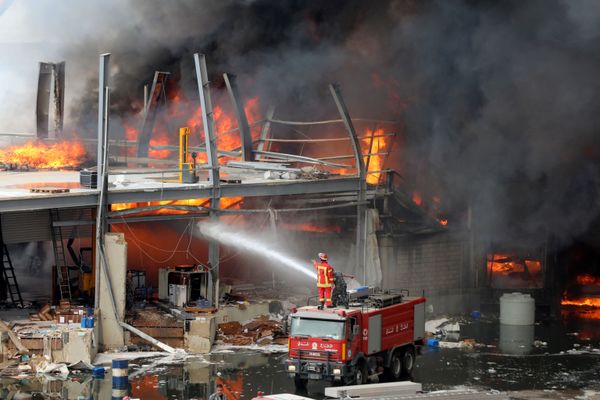 A member of the civil defence reacts as he tries to put out a fire that broke out at Beirut's port area, Lebanon September 10, 2020 A member of the civil defence reacts as he tries to put out a fire that broke out at Beirut's port area, Lebanon September 10, 2020 - Sputnik International