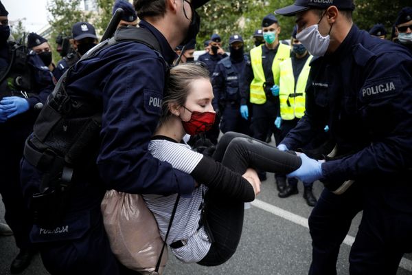Law enforcement officers detain a participant during a protest of Extinction Rebellion climate activists in Warsaw, Poland September 7, 2020 Law enforcement officers detain a participant during a protest of Extinction Rebellion climate activists in Warsaw, Poland September 7, 2020 - Sputnik International