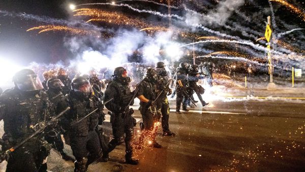 Police use chemical irritants and crowd control munitions to disperse protesters during a demonstration in Portland, Ore., Saturday, Sept. 5, 2020 - Sputnik International