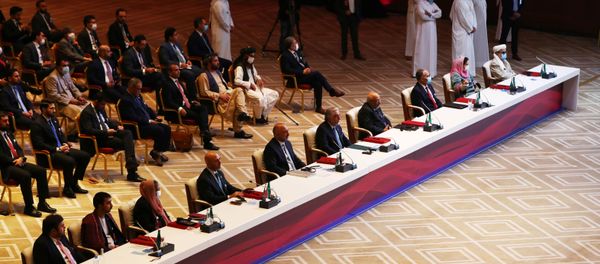Delegates are seen before talks between the Afghan government and Taliban insurgents in Doha, Qatar September 12, 2020.  - Sputnik International