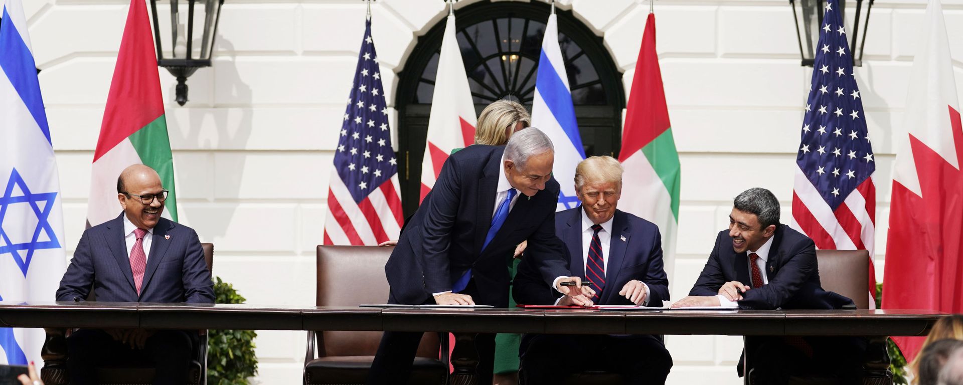 President Donald Trump, center, with from left, Bahrain Foreign Minister Khalid bin Ahmed Al Khalifa, Israeli Prime Minister Benjamin Netanyahu, Trump, and United Arab Emirates Foreign Minister Abdullah bin Zayed al-Nahyan, during the Abraham Accords signing ceremony on the South Lawn of the White House, Tuesday, Sept. 15, 2020, in Washington. (AP Photo/Alex Brandon) - Sputnik International, 1920, 12.07.2022
