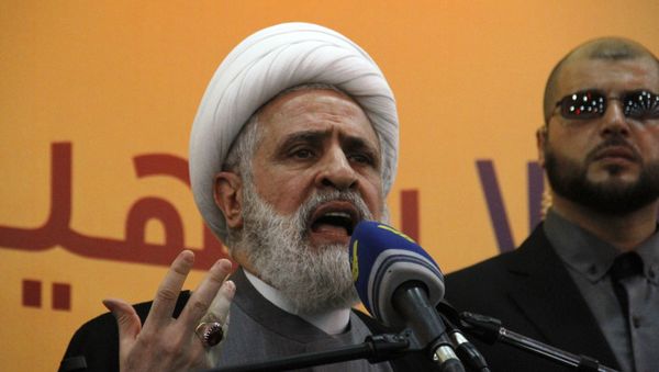 The deputy chief of Lebanon's powerful Shiite militant group Hezbollah, Sheikh Naim Qassem speaks during the funeral of Mustafa Badreddine, a top Hezbollah commander who was killed in an attack in Syria, at the martyrs' cemetery in the Ghobeiry neighbourhood of southern Beirut on May 13, 2016. - Sputnik International