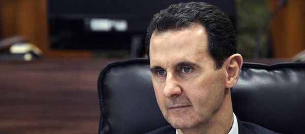 In this Jan. 7, 2020 file photo, Syrian President Bashar Assad listens to Russian President Vladimir Putin during their meeting in Damascus, Syria. Assad interrupted a speech he was giving to Parliament after he suffered a brief drop in blood pressure, the Syrian presidency said Wednesday, Aug. 12, 2020 In this Jan. 7, 2020 file photo, Syrian President Bashar Assad listens to Russian President Vladimir Putin during their meeting in Damascus, Syria. Assad interrupted a speech he was giving to Parliament after he suffered a brief drop in blood pressure, the Syrian presidency said Wednesday, Aug. 12, 2020 - Sputnik International