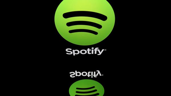 This combination created on March 13, 2019 of file illustrations displayed on tablet screens shows the logo of the US multinational technology company Apple (bottom, February 18, 2019 in Paris) and the logo of online streaming music service Spotify (April 19, 2018 in Paris). - Swedish music streaming giant Spotify said on March 13, 2019 it had filed a formal complaint with the EU Commission against Apple, accusing its US rival of stifling competition in the online music market. This combination created on March 13, 2019 of file illustrations displayed on tablet screens shows the logo of the US multinational technology company Apple (bottom, February 18, 2019 in Paris) and the logo of online streaming music service Spotify (April 19, 2018 in Paris). - Swedish music streaming giant Spotify said on March 13, 2019 it had filed a formal complaint with the EU Commission against Apple, accusing its US rival of stifling competition in the online music market. - Sputnik International
