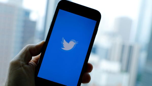 The Twitter App loads on an iPhone in this illustration photograph taken in Los Angeles, California, U.S., July 22, 2019. The Twitter App loads on an iPhone in this illustration photograph taken in Los Angeles, California, U.S., July 22, 2019. - Sputnik International