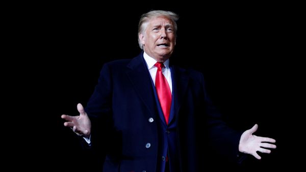 U.S. President Donald Trump gestures as he speaks during a campaign event at the Central Wisconsin Airport in Mosinee, Wisconsin, U.S., September 17, 2020. - Sputnik International