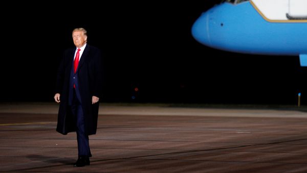 US President Donald Trump walks on the tarmac as he arrives for a campaign event at the Central Wisconsin Airport in Mosinee, Wisconsin, US, September 17, 2020 - Sputnik International
