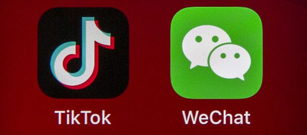 Icons for the smartphone apps TikTok and WeChat are seen on a smartphone screen in Beijing, Friday, Aug. 7, 2020 Icons for the smartphone apps TikTok and WeChat are seen on a smartphone screen in Beijing, Friday, Aug. 7, 2020 - Sputnik International
