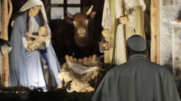 In this Dec. 31, 2019 file photo, Pope Francis stops by the Nativity exposed in St. Peter's square after presiding over vespers of the Feast of St. Mary and Te Deum of Thanksgiving at year's end, in St. Peter's Basilica at the Vatican. - Sputnik International