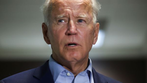 Democratic U.S. presidential nominee and former Vice President Joe Biden speaks about the death of U.S. Supreme Court Associate Justice Ruth Bader Ginsburg shortly after Biden arrived from campaign events in Minnesota at New Castle Airport in New Castle, Delaware, U.S., September 18, 2020. - Sputnik International