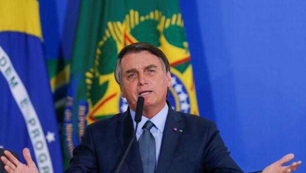 Brazil's President Jair Bolsonaro speaks during an inauguration ceremony of the new Health Minister Eduardo Pazuello (not pictured) at the Planalto Palace in Brasilia, Brazil, September 16, 2020. - Sputnik International