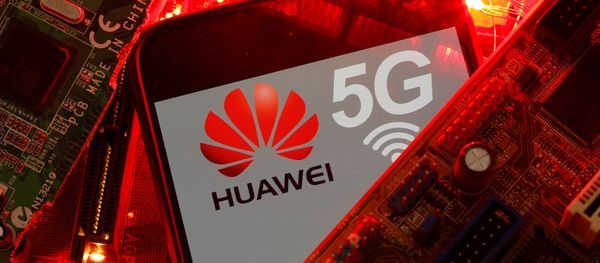 A smartphone with the Huawei and 5G network logo is seen on a PC motherboard in this illustration picture taken January 29, 2020 A smartphone with the Huawei and 5G network logo is seen on a PC motherboard in this illustration picture taken January 29, 2020 - Sputnik International