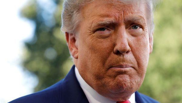 U.S. President Donald Trump speaks to the media on the South Lawn of the White House in Washington, before his departure on campaign travel to Fayetteville, North Carolina, U.S., September 19, 2020. - Sputnik International