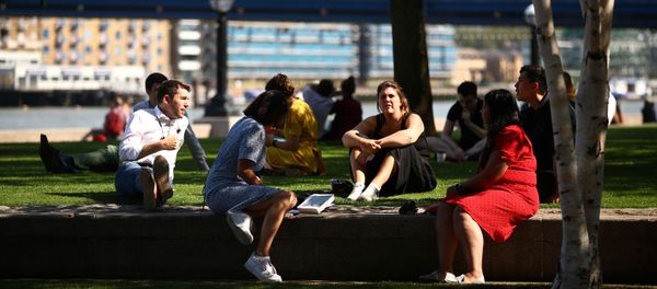 People sit in a park, as the spread of coronavirus disease (COVID-19) continues, in London, Britain, 14 September 2020 - Sputnik International