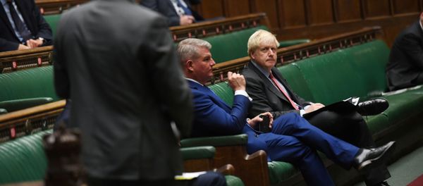 Britain's Prime Minister Boris Johnson looks on during a PM's statement session on the coronavirus disease (COVID-19) in the House of Commons, in London, Britain September 22, 2020. Britain's Prime Minister Boris Johnson looks on during a PM's statement session on the coronavirus disease (COVID-19) in the House of Commons, in London, Britain September 22, 2020. - Sputnik International