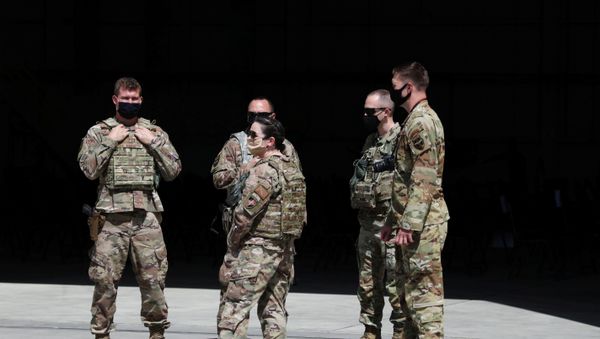 U.S. troops stand guard during a handover ceremony of A-29 Super Tucano planes from U.S. to the Afghan forces, in Kabul, Afghanistan September 17, 2020 - Sputnik International