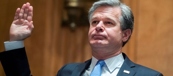 FBI Director Christopher Wray, is sworn into the Senate Homeland Security and Governmental Affairs Committee during a hearing on Threats to the Homeland, on Capitol Hill in Washington, U.S., September 24, 2020. FBI Director Christopher Wray, is sworn into the Senate Homeland Security and Governmental Affairs Committee during a hearing on Threats to the Homeland, on Capitol Hill in Washington, U.S., September 24, 2020. - Sputnik International