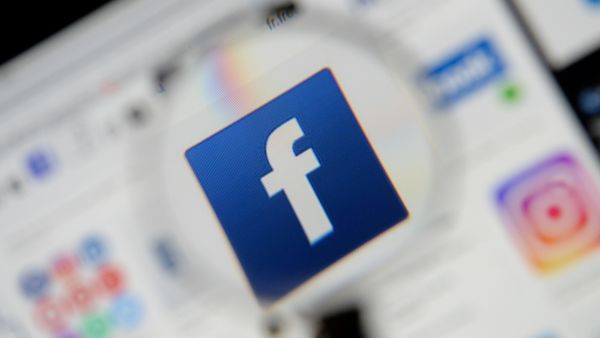 The Facebook logo is seen on a screen in this picture illustration taken 2 December 2019.  - Sputnik International