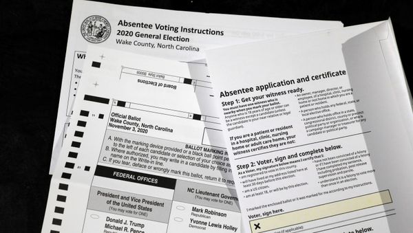 An absentee ballot and required paperwork await preparations at the Wake County Board of Elections on the first day that the state started mailing them out, in Raleigh, North Carolina, U.S. September 4, 2020.  - Sputnik International
