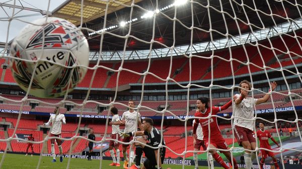 Soccer Football - FA Community Shield - Arsenal v Liverpool - Wembley Stadium, London, Britain - August 29, 2020 Liverpool's Takumi Minamino celebrates scoring their first goal, as play resumes behind closed doors following the outbreak of the coronavirus disease (COVID-19) Soccer Football - FA Community Shield - Arsenal v Liverpool - Wembley Stadium, London, Britain - August 29, 2020 Liverpool's Takumi Minamino celebrates scoring their first goal, as play resumes behind closed doors following the outbreak of the coronavirus disease (COVID-19) - Sputnik International