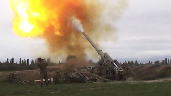 Azerbaijani forces carry out a strike against Armenian military during the conflict in Nagorno-Karabakh - Sputnik International