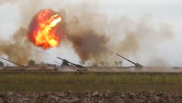 Azerbaijani forces carry out a strike against Armenian military during the conflict in Nagorno-Karabakh - Sputnik International