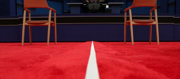 A white line divides the two halves of the audience as the stage awaits U.S. President Donald Trump and Democratic U.S. presidential nominee and former Vice President Joe Biden before their first presidential debate on the campus of the Cleveland Clinic in Cleveland, Ohio, U.S. September 29, 2020. A white line divides the two halves of the audience as the stage awaits U.S. President Donald Trump and Democratic U.S. presidential nominee and former Vice President Joe Biden before their first presidential debate on the campus of the Cleveland Clinic in Cleveland, Ohio, U.S. September 29, 2020. - Sputnik International