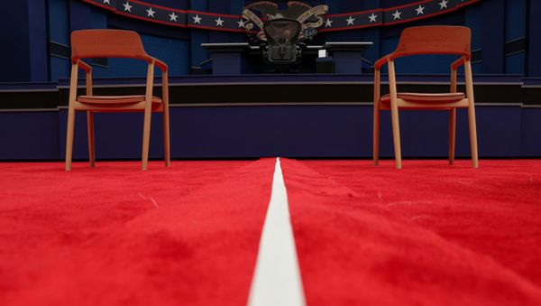 A white line divides the two halves of the audience as the stage awaits U.S. President Donald Trump and Democratic U.S. presidential nominee and former Vice President Joe Biden before their first presidential debate on the campus of the Cleveland Clinic in Cleveland, Ohio, U.S. September 29, 2020. A white line divides the two halves of the audience as the stage awaits U.S. President Donald Trump and Democratic U.S. presidential nominee and former Vice President Joe Biden before their first presidential debate on the campus of the Cleveland Clinic in Cleveland, Ohio, U.S. September 29, 2020. - Sputnik International