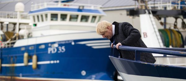 Boris Johnson looks over the side of a trawler in the Scottish fishing port of Peterhead Boris Johnson looks over the side of a trawler in the Scottish fishing port of Peterhead - Sputnik International