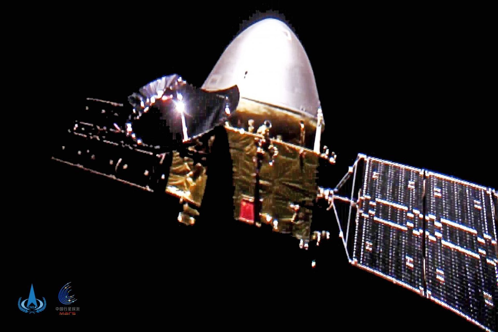 The China National Space Administration on Thursday published pictures of its first Mars rover, Tianwen-1, which have been made by the spacecraft itself en route to the Red Planet The China National Space Administration on Thursday published pictures of its first Mars rover, Tianwen-1, which have been made by the spacecraft itself en route to the Red Planet - Sputnik International, 1920, 31.01.2022