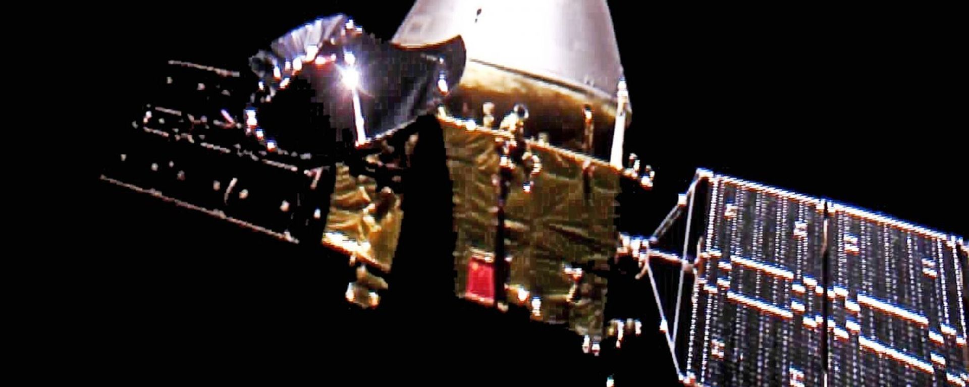 The China National Space Administration on Thursday published pictures of its first Mars rover, Tianwen-1, which have been made by the spacecraft itself en route to the Red Planet The China National Space Administration on Thursday published pictures of its first Mars rover, Tianwen-1, which have been made by the spacecraft itself en route to the Red Planet - Sputnik International, 1920, 15.05.2021
