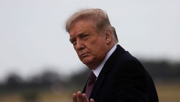 U.S. President Donald Trump arrives on campaign travel at Morristown Municipal Airport in Morristown, New Jersey, U.S., October 1, 2020. - Sputnik International